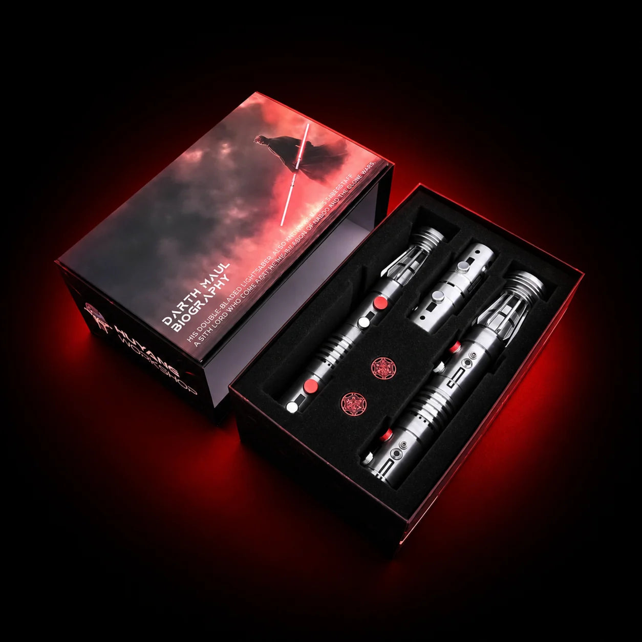 Maul hilts and components presented in the collector display box