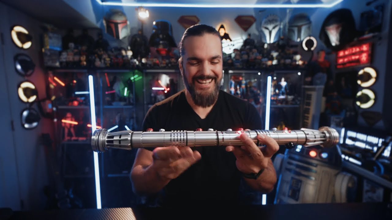 The Collectors Outpost presenting the Maul hilt in his video review